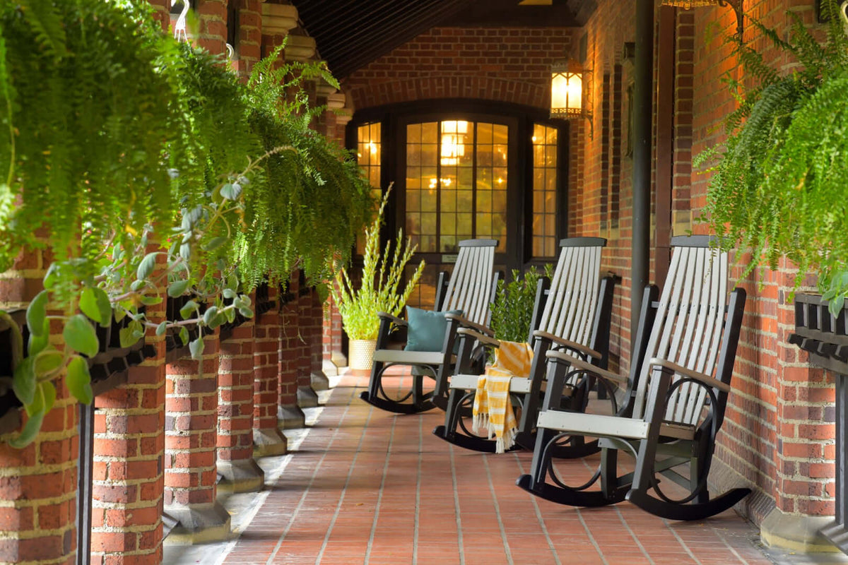 LuxCraft Grandpa's Rocker | Outdoor Rocking Chair in Dove Gray and Black positioned for front-porch use — all-weather outdoor build