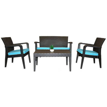 Black 4-piece outdoor seating set with teal cushions includes 1 coffee table, 2 stackable armchairs and 1 loveseat