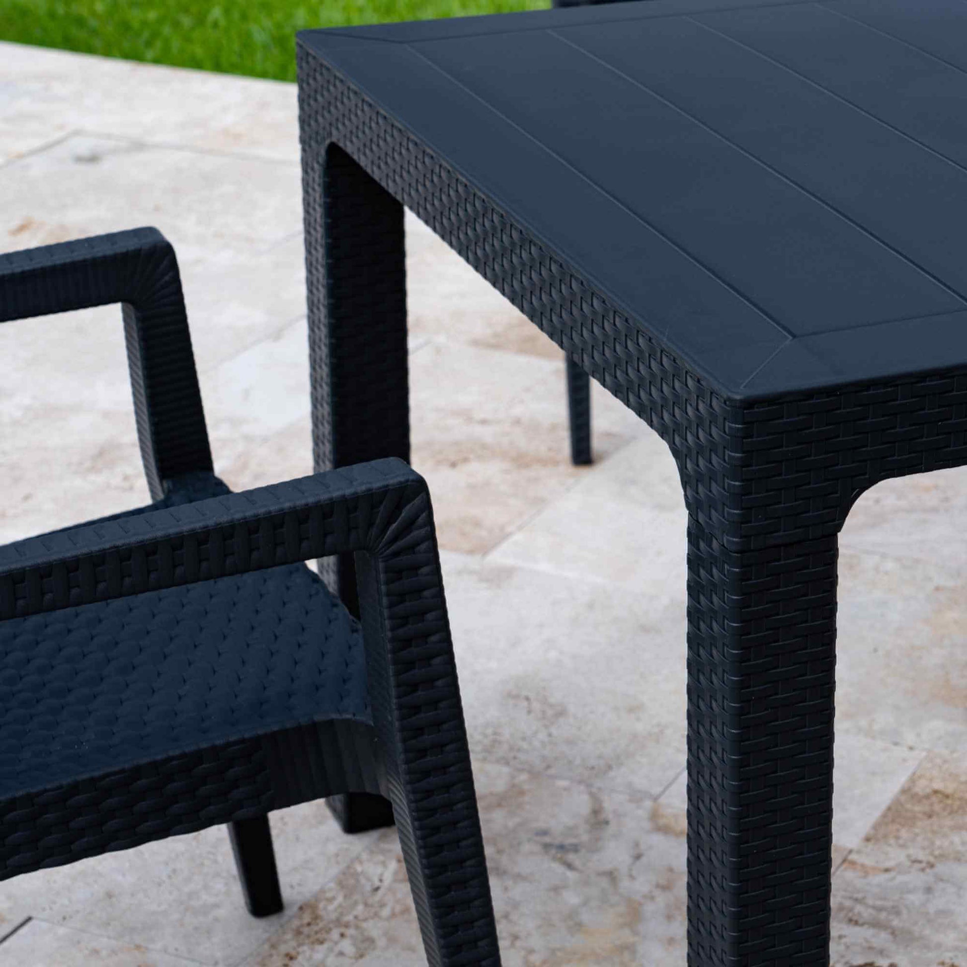 Black 5-piece outdoor dining set includes 1 square table and 4 wicker stackable armchairs