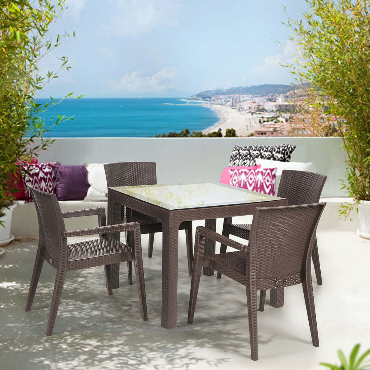 Brown 5-piece outdoor dining set includes 1 square table and 4 wicker stackable armchairs