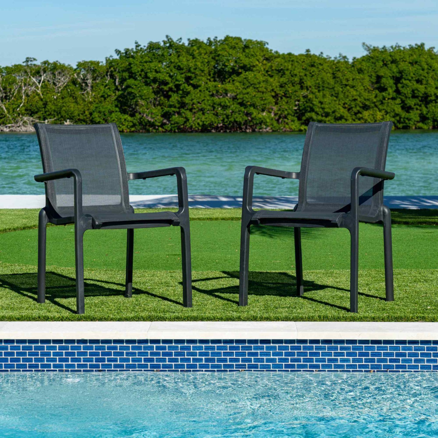 Black sleek set of 2 outdoor sling armchairs with stackable design for easy storage