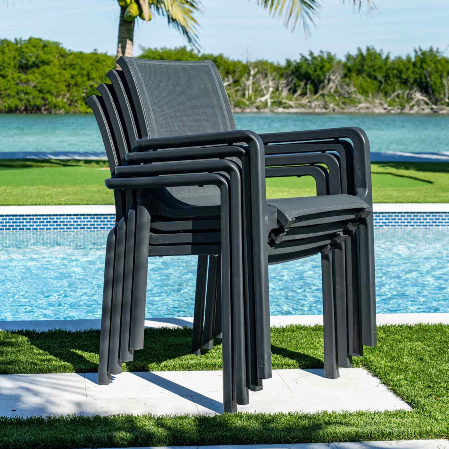 Black sleek set of 2 outdoor sling armchairs with stackable design for easy storage