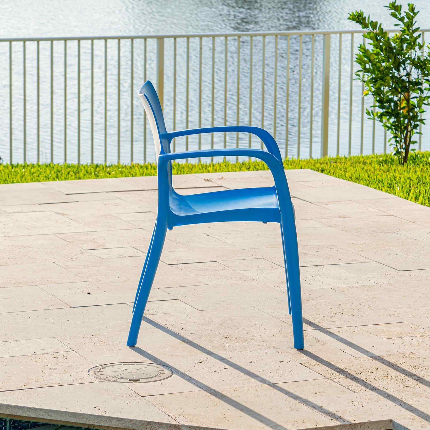 Blue set of 2 outdoor stackable armchairs made of UV resistant resin reinforced with glass fiber