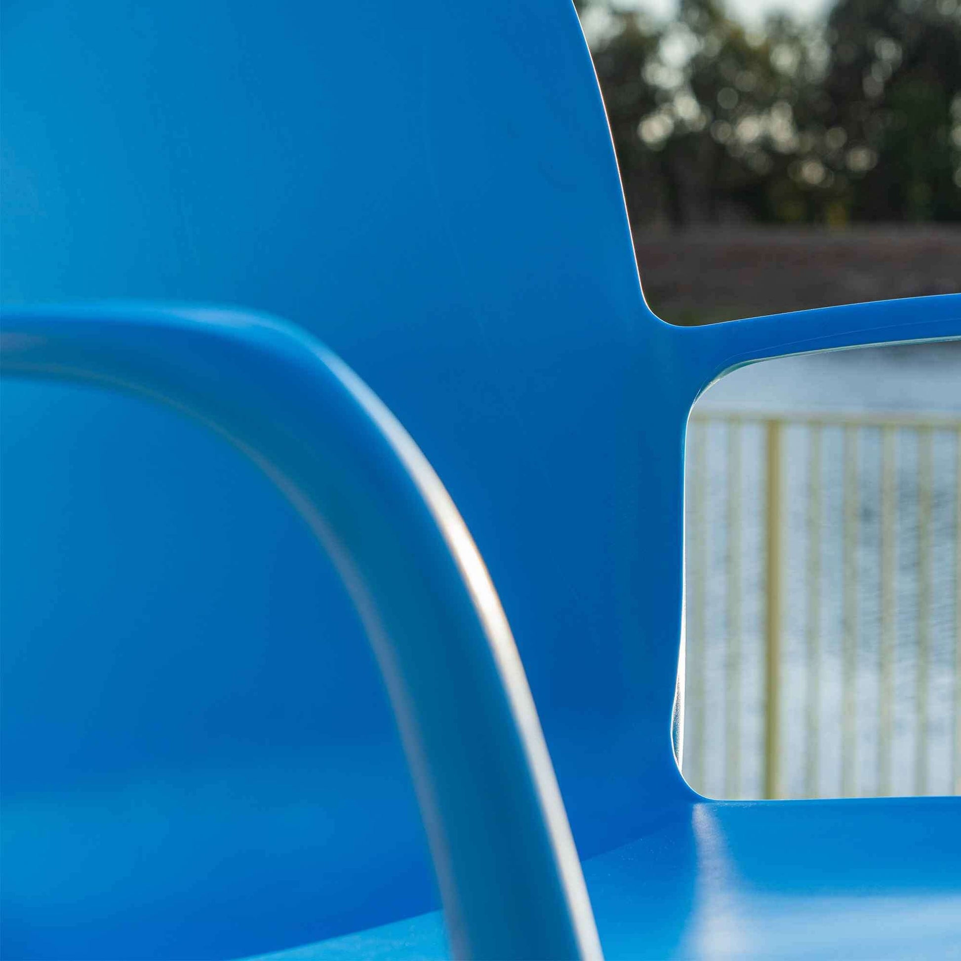 Blue set of 2 outdoor stackable armchairs made of UV resistant resin reinforced with glass fiber