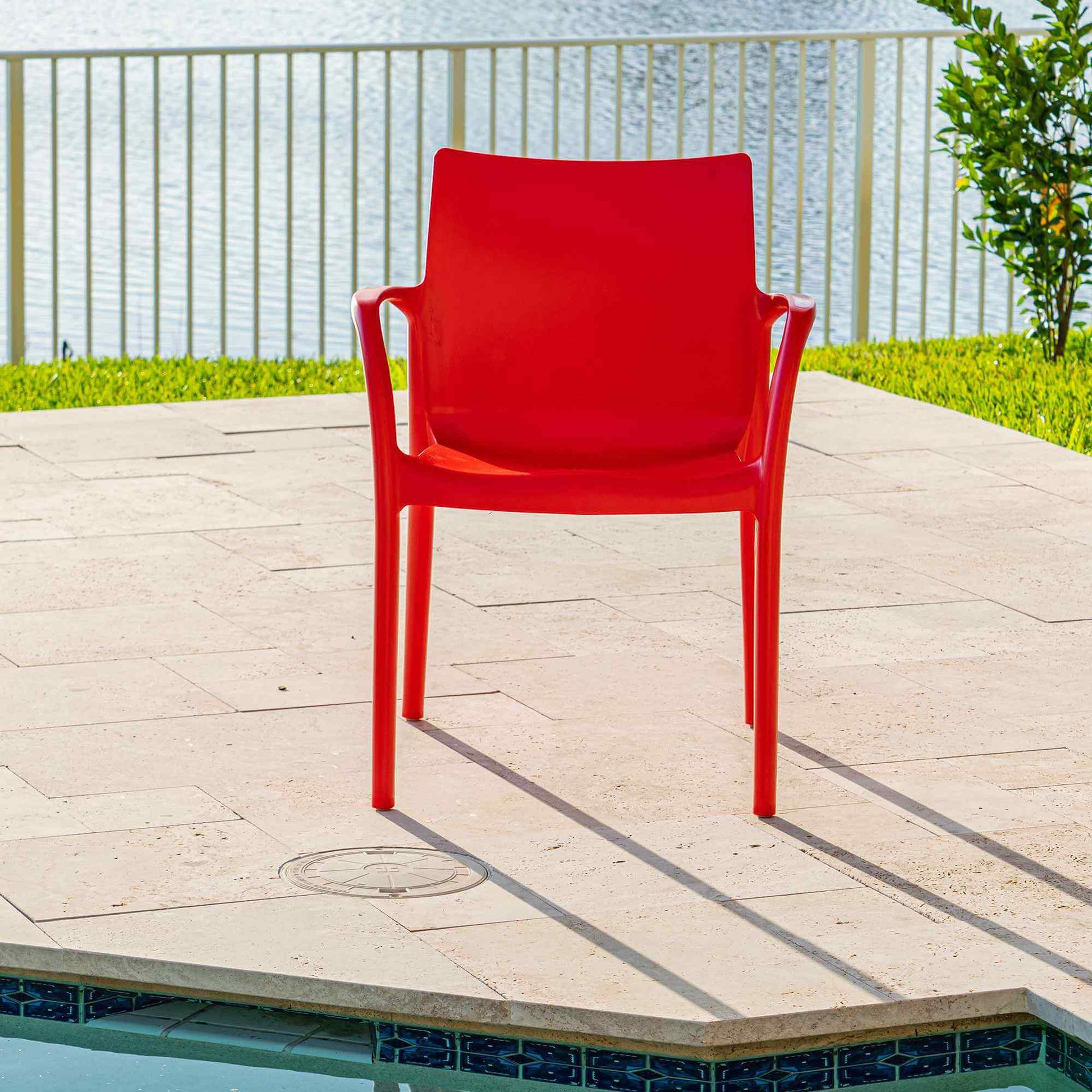 Red set of 2 outdoor stackable armchairs made of UV resistant resin reinforced with glass fiber