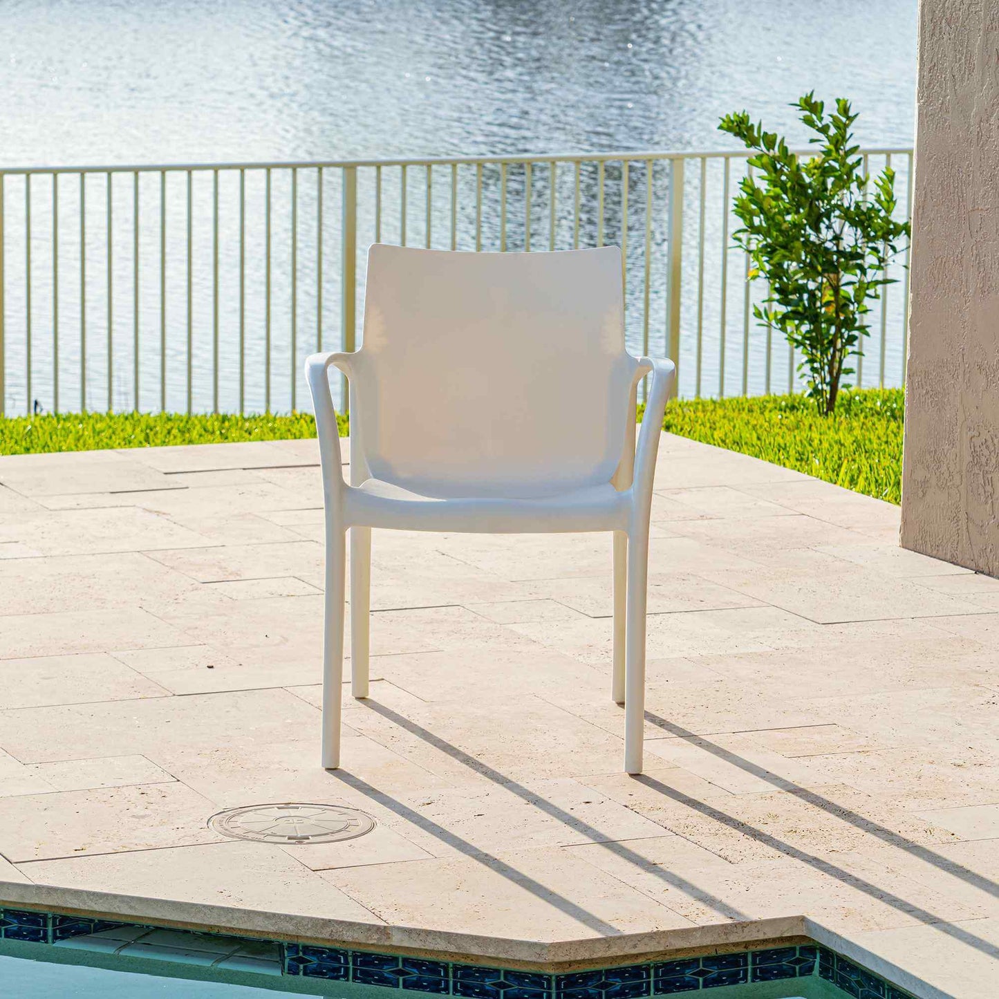 White set of 2 outdoor stackable armchairs made of UV resistant resin reinforced with glass fiber