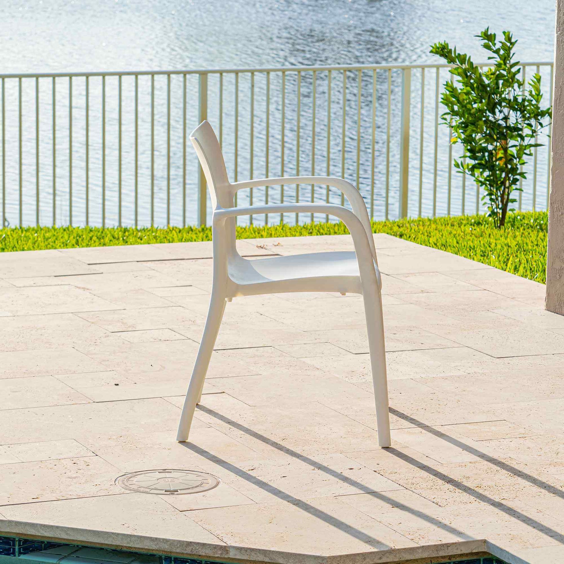 White set of 2 outdoor stackable armchairs made of UV resistant resin reinforced with glass fiber