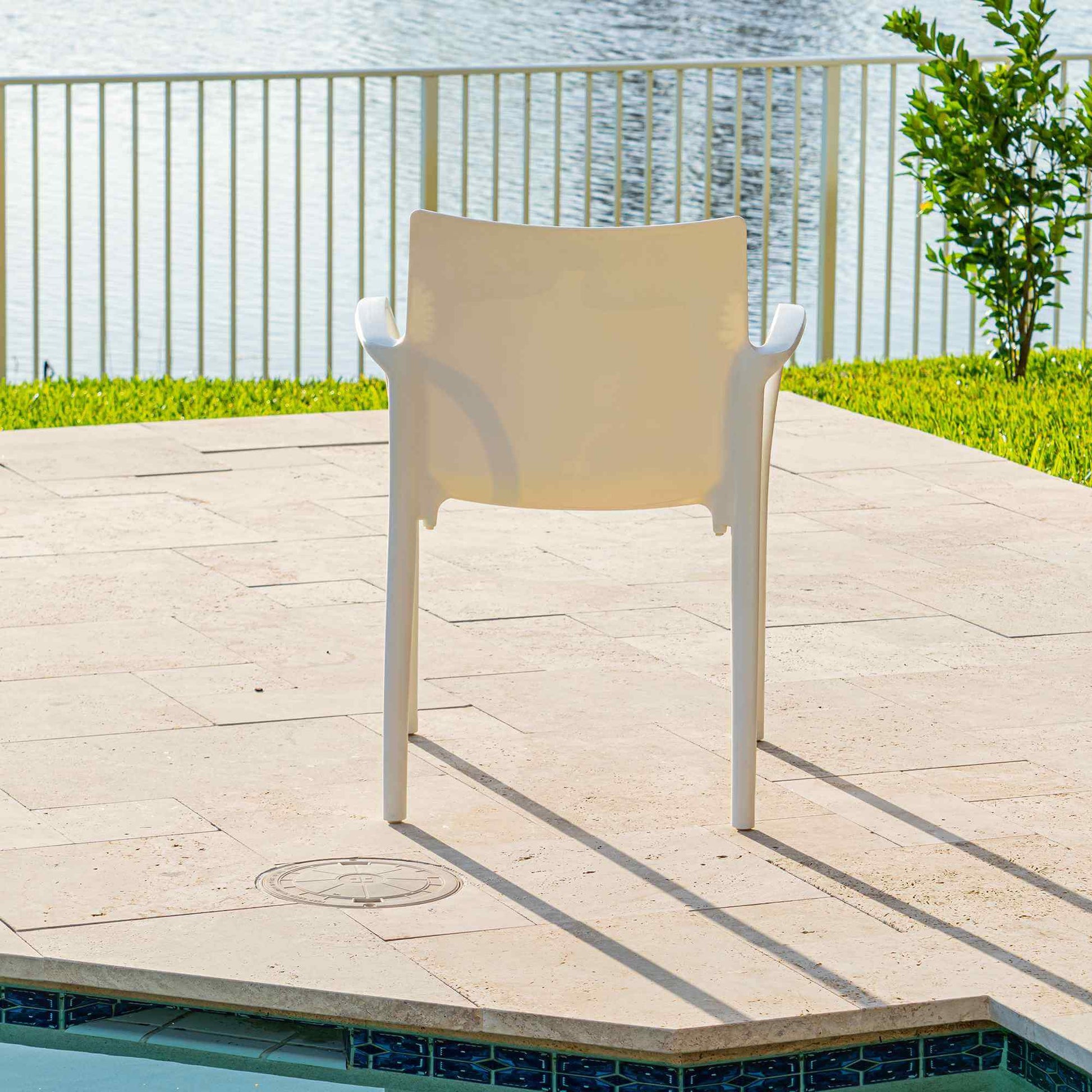 White set of 2 outdoor stackable armchairs made of UV resistant resin reinforced with glass fiber