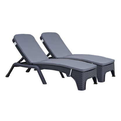 Black outdoor 3-piece chaise lounger set includes 2 stackable chaise loungers and an end table