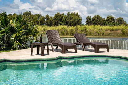 Brown outdoor 3-piece chaise lounger set includes 2 stackable chaise loungers and an end table