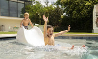 Designed for water depths of 0-12 inches, this slide is ideal for your pool’s tanning ledge, sun shelf, or on-deck use, creating a playful oasis for children ages 3 and up.