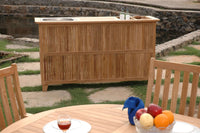 Anderson Teak Outdoor Bar Table Equipped with 7 drawers and 1 cabinet, wine glass hangers, removable ice bucket and integrated aluminum sink