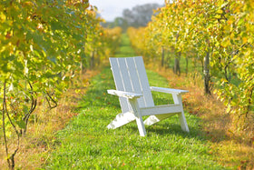LuxCraft Urban Adirondack Chair in White — wide armrests and reclined back for backyard relaxation