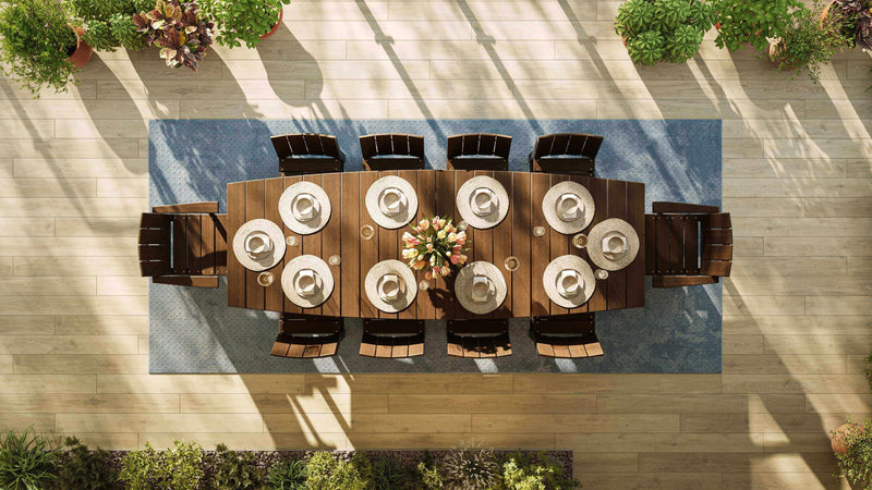 LuxCraft oval outdoor dining table 11-piece set includes 1 dining table, 2 arm chairs and 8 side chairs made from eco-friendly materials